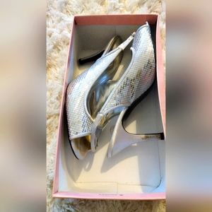 Used once silver royal shimmery heels